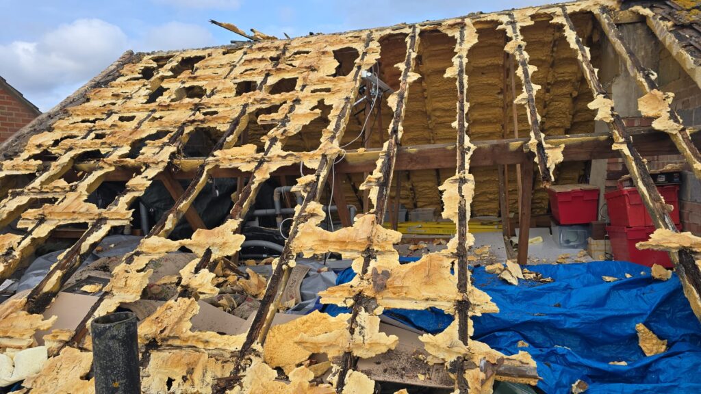 This is a spray foam removal job in progress on a residential property in West Sussex.