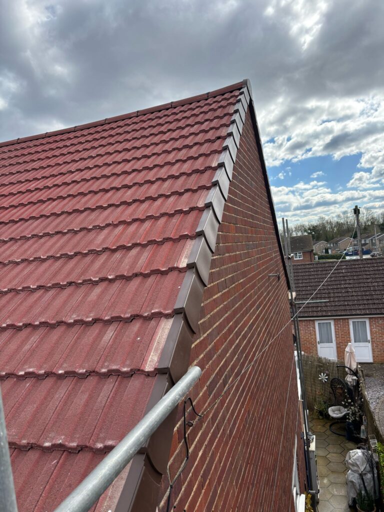 This photo shows a roof in West Sussex before spray foam removal started.